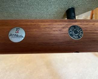 Photo of the tags on each of the five mid-century/Danish modern chairs by John Stuart (Grand Rapids/New York).