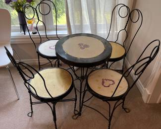Vintage ice cream parlor table and chairs.