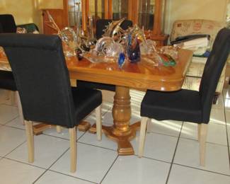 Melanie dining room table 2 leaves 6 chairs