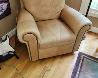 Leather upholstered armchair and other pieces