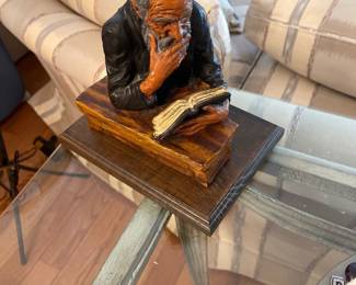 rabbi reading figure statue