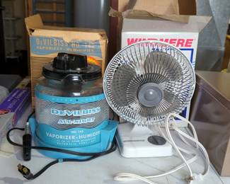 Windmere 7" Two Speed Oscillating Fan And DeVilbiss, No. 145 Vaporizer/Humidifier, Both In Original Boxes And Power On

