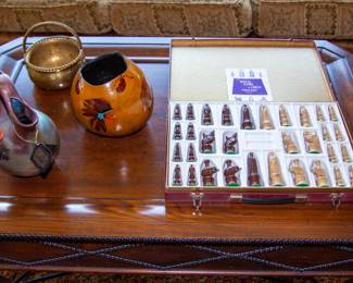 Intricate detailed chess set and display vases