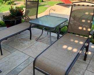 lounge chairs and outdoor table