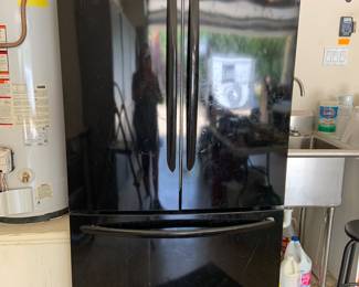 Frigidaire black french door fridge, works great, 11 Y/O