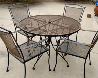 black patio table chairs