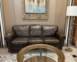 We have another brown leather couch just like this one.  Lots of coffee/end tables