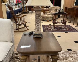 lots of occasional tables and lamps