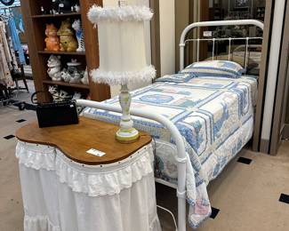 twin iron bed and vintage vanity