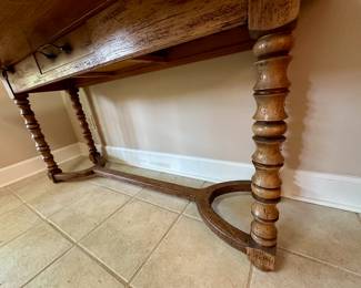 Leg details of console table in previous picture. Note center drawer.
