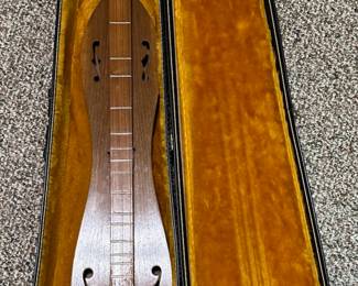 Redwood and curly oak dulcimer.