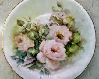 Gold edged rose pattern Limoges plate.