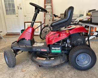 Vintage Craftsman riding lawn mower.