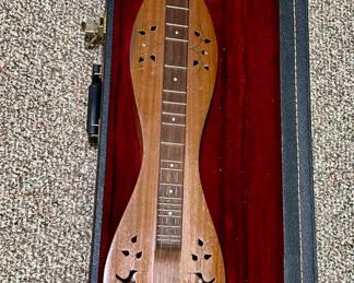 Bird-themed mountain dulcimer.