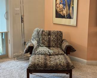 Rosewood lounge & ottoman with padded upholstery