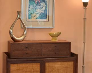 Leroy Nieman screen print, "Skier", framed. Walnut flatware chest of drawers. Caned Front Mid Century Modern Credeza