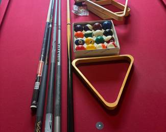 Pool table includes accessories 