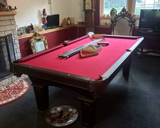 8 foot Olhausen pool table (located on flat ground level)