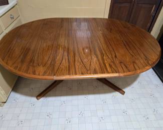 Mid Century Modern Teak Table has 3 chairs (need repair) shown with leaf insert