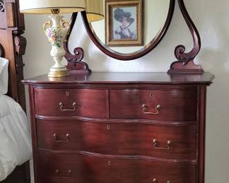 Curved front chest of drawers