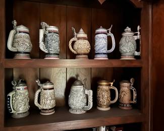 Various Avon collectible steins