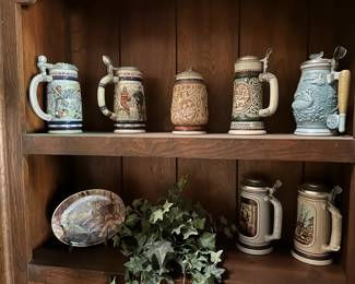 Various Avon collectible steins