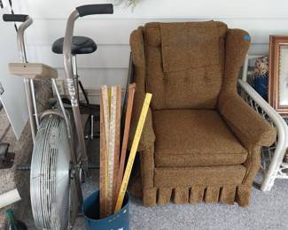 exercise bike, yard sticks, arm chair