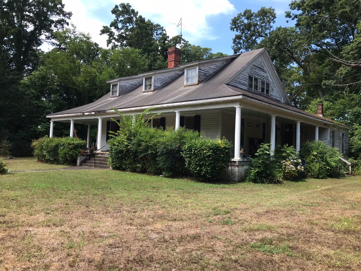 Two floors, a wrap around porch, and a barn out back!