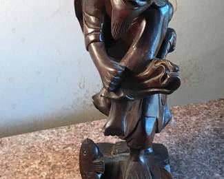 Carved Asian statue 