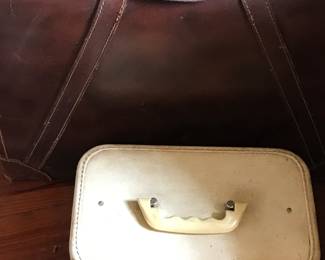 Vintage leather suitcase and a traincase