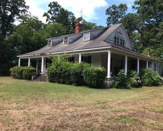 Two floors, a wrap around porch, and a barn out back!