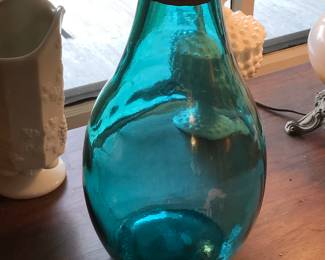 Large blue glass bottle