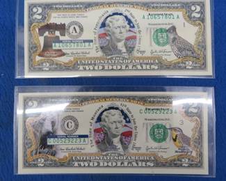 Lot 405. Two $2 bills with color overlay featuring Montana and Pennsylvania
