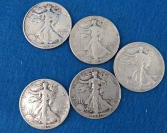 Lot 13. Five Walking Liberty silver half dollars