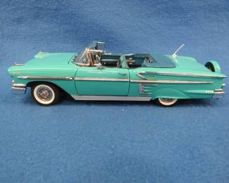 Lot 452. Danbury Mint 1958 Chevrolet Impala convertible.&nbsp; 1:24 scale die-cast car.