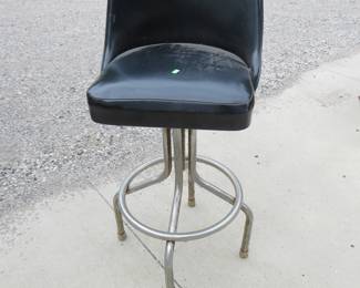 Lot 105. Metal-framed swivel bar stool
