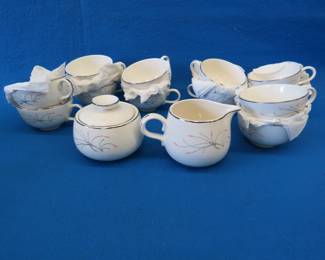 Lot 84. 1950s Homer Laughlin Rhythm Capri china.&nbsp; 12 cups and a cream and sugar bowl.
