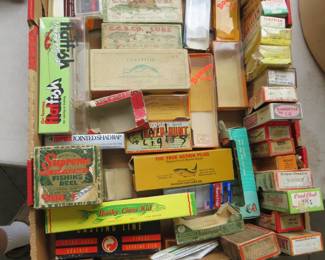 Lot 30. Empty fishing lure boxes including Heddon, Cisco Kid, Creek Chub Bait, South Bend, and more