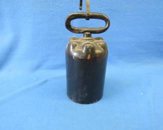 Lot 87. Heavy metal bell with holder. 13" x 6.5"