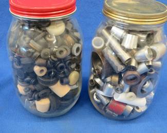 Lot 363. Two one-gallon glass jars with rubber feet, grommets, and metal pieces