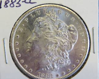 Lot 445. 1883 CC AU Morgan Silver Dollar