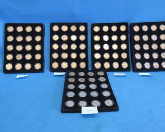 Lot 440. Five trays of 20 each gold colored state quarters. 2000, 2002, 2003,2004,and 2006
