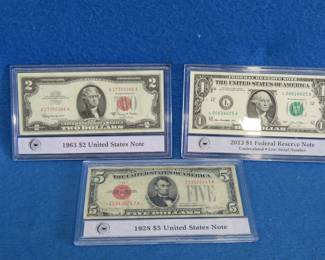 Lot 389. Three collectible bill sets: 2013 $1.00 uncirculated Federal Reserve Note, 1963 $2.00 US Note, 1928 $5.00 Red Seal US Note