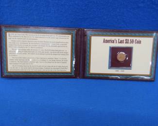 Lot 25. 1911 $2.50 Indian Head gold coin in a presentation case