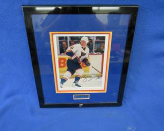 Lot 28. Framed and triple-matted autographed photo of Brett Hull.&nbsp; 19" x 17".