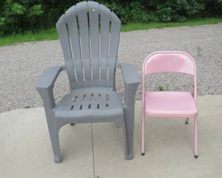 Lot 107. Large plastic chair and a metal folding chair