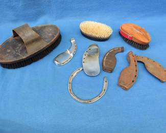 Lot 50. Antique oxen shoes, curry combs. Seller reports he got these from the Earle Brown Farm