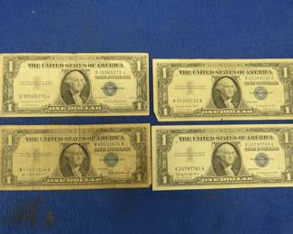 Lot 409. Four $1 Silver Certificates