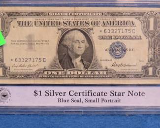 Lot 251. $1 Silver Certificate Star Note. Blue Seal, small portrait