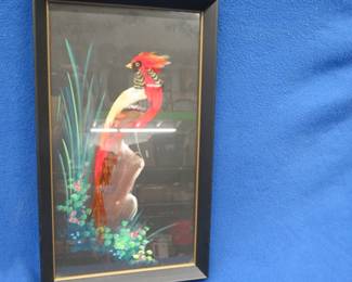Lot 194. Feather picture in wooden frame